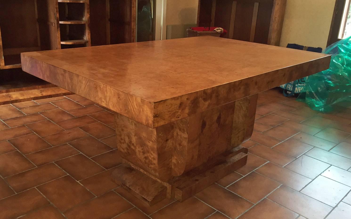 Art Deco burled elm dining room table, 1935.
Three original leaves available (not veneer).
Complete dining room set available.
73 X 156 X 100 cm.
73 X 300 X 100 cm.