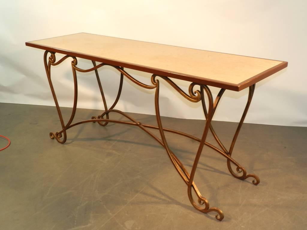 Large gilt wrought iron and marble console, 1970. All side finished.