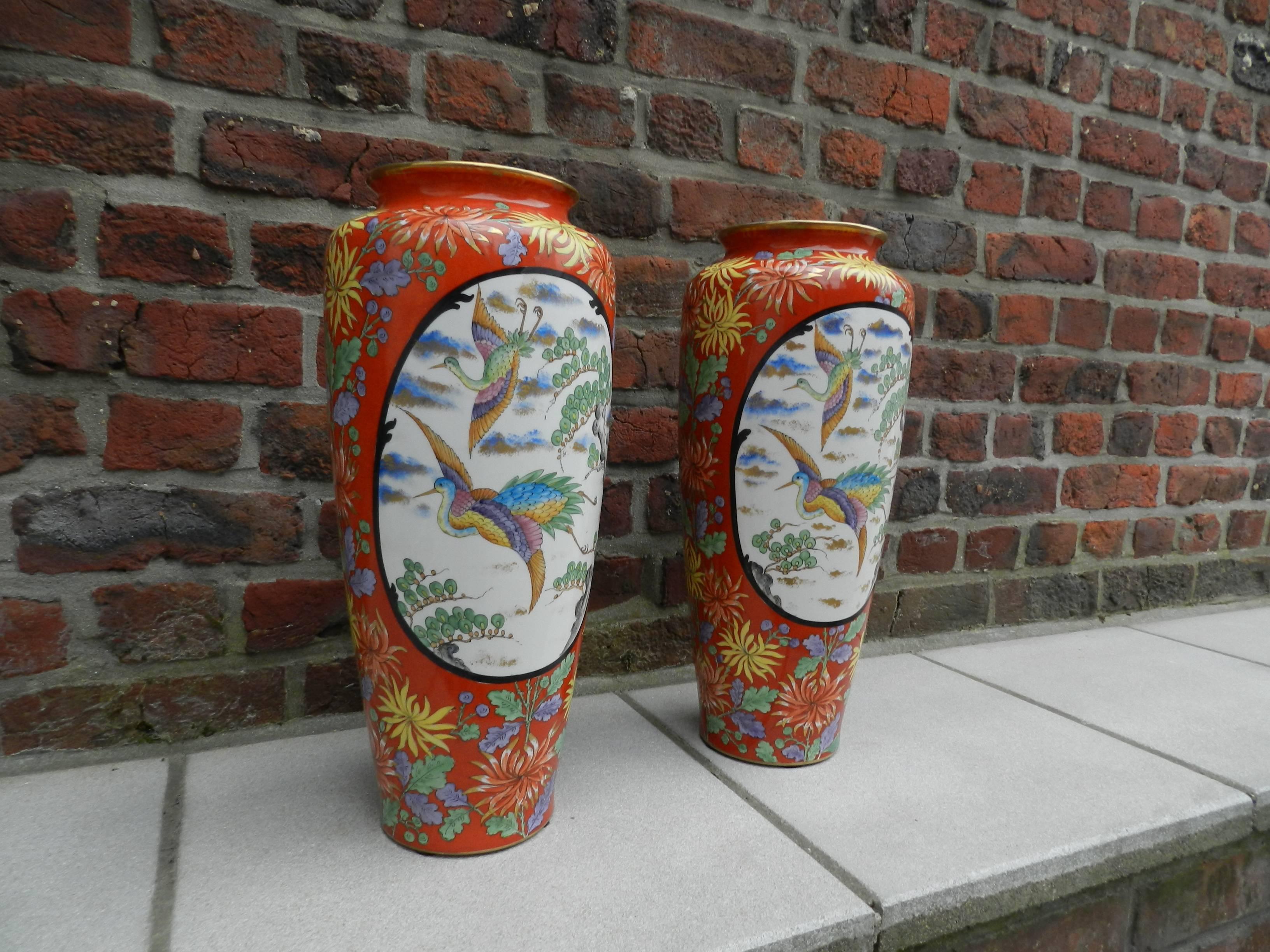 Tressmann & Vogt, pair of high Limoges porcelain vases, circa 1910.