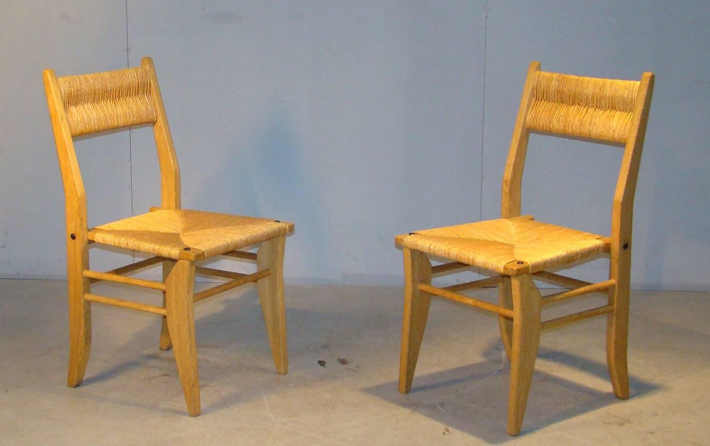Guillerme et Chambron, set of six oak chairs. Edition Votre Maison, 1960.