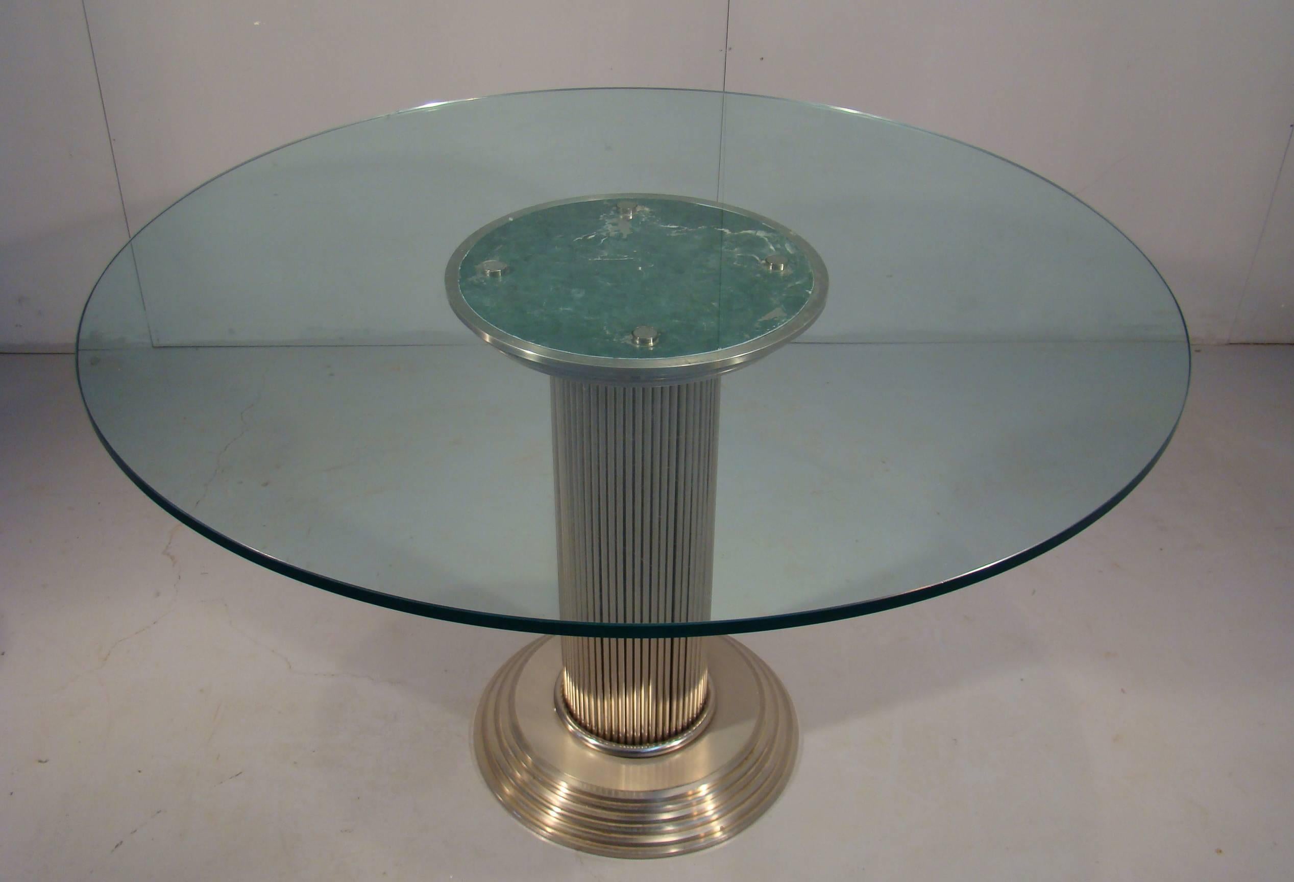 Nicked-plated brass table with glass top, Italy, circa 1960.