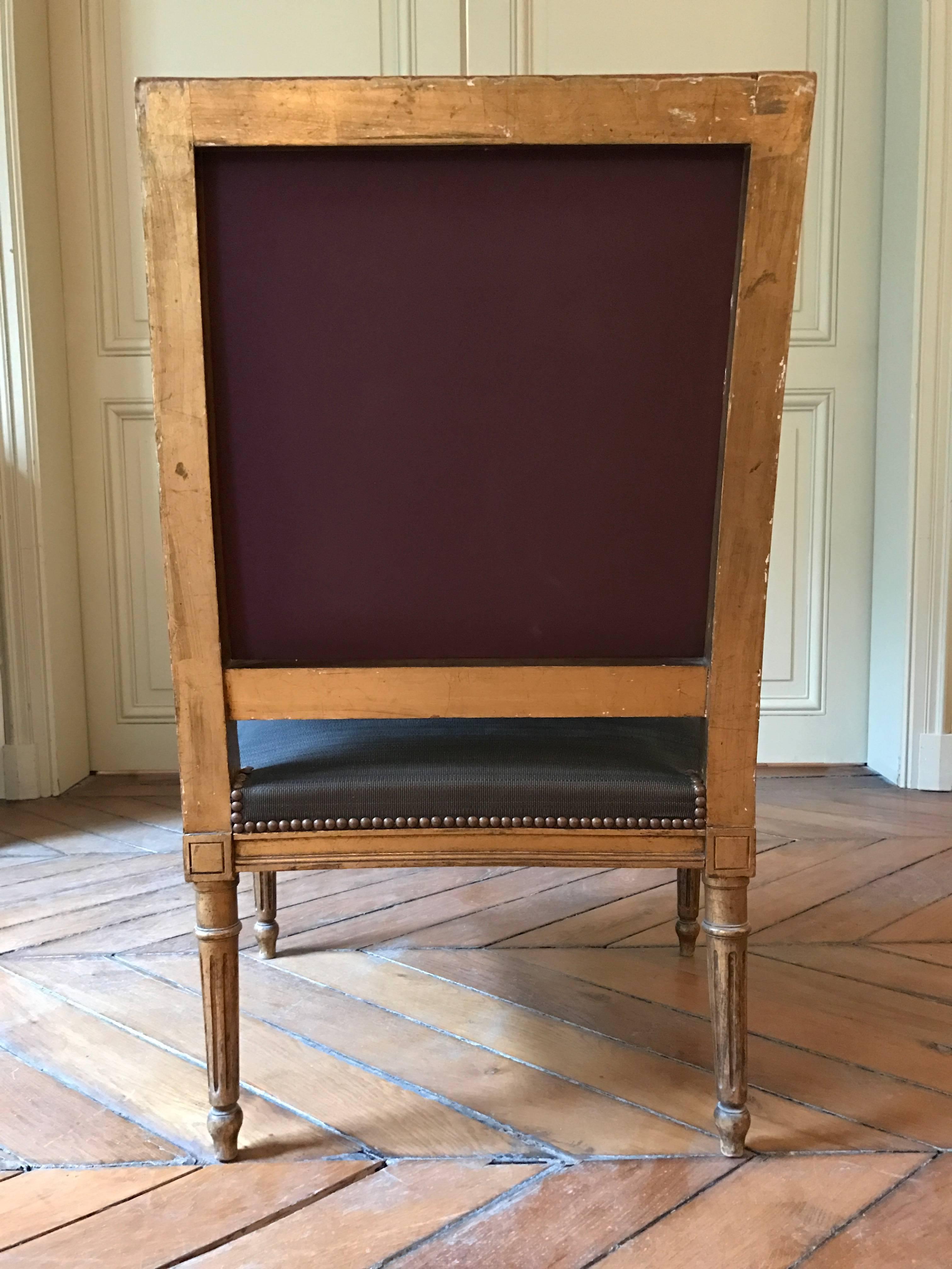 Pair of 19th century gilt Louis XVI armchairs chocolate horse hair upholstery.