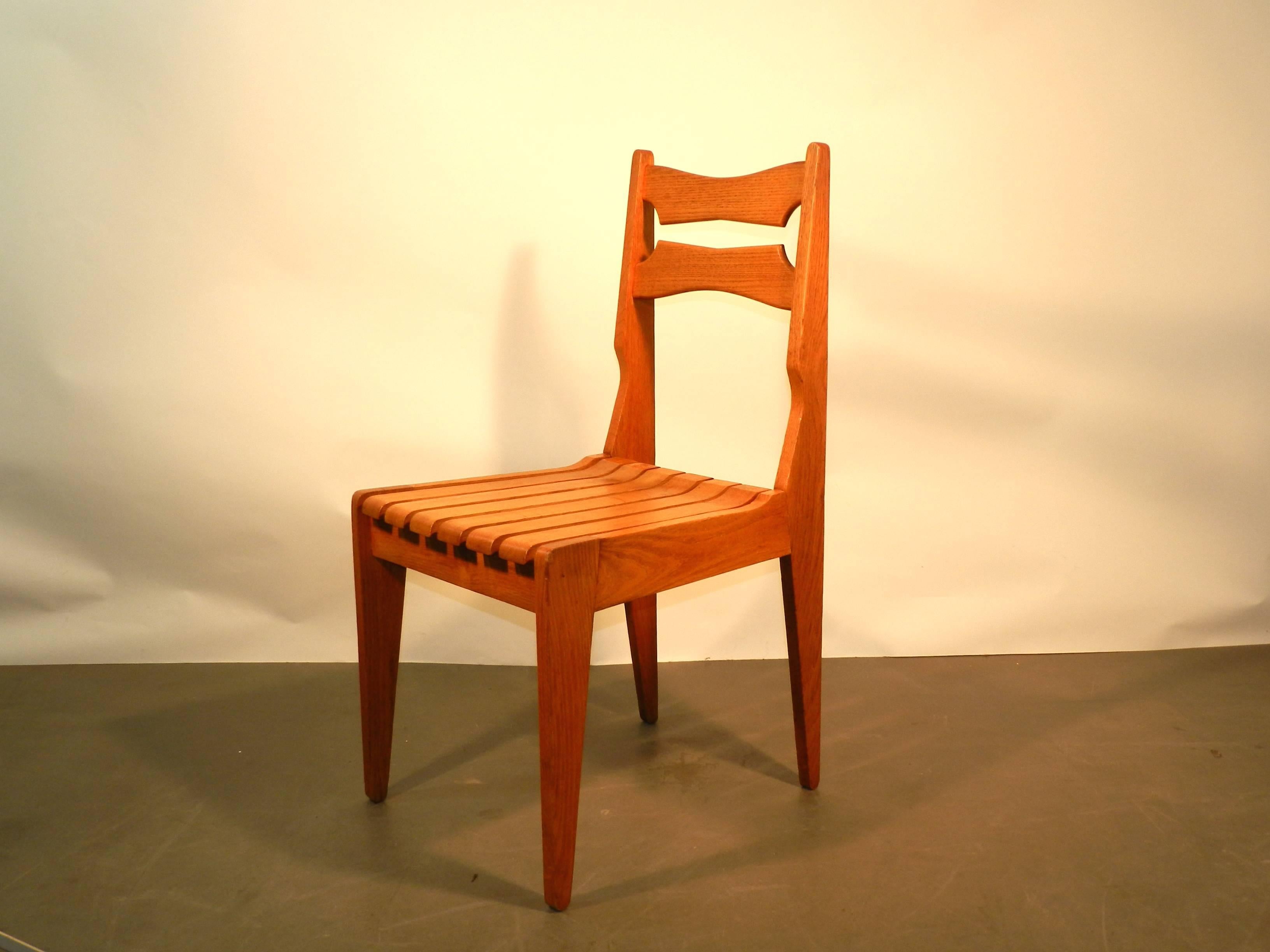 Set of Six oak chairs by Guillerme et Chambron for Votre Maison, circa 1960.