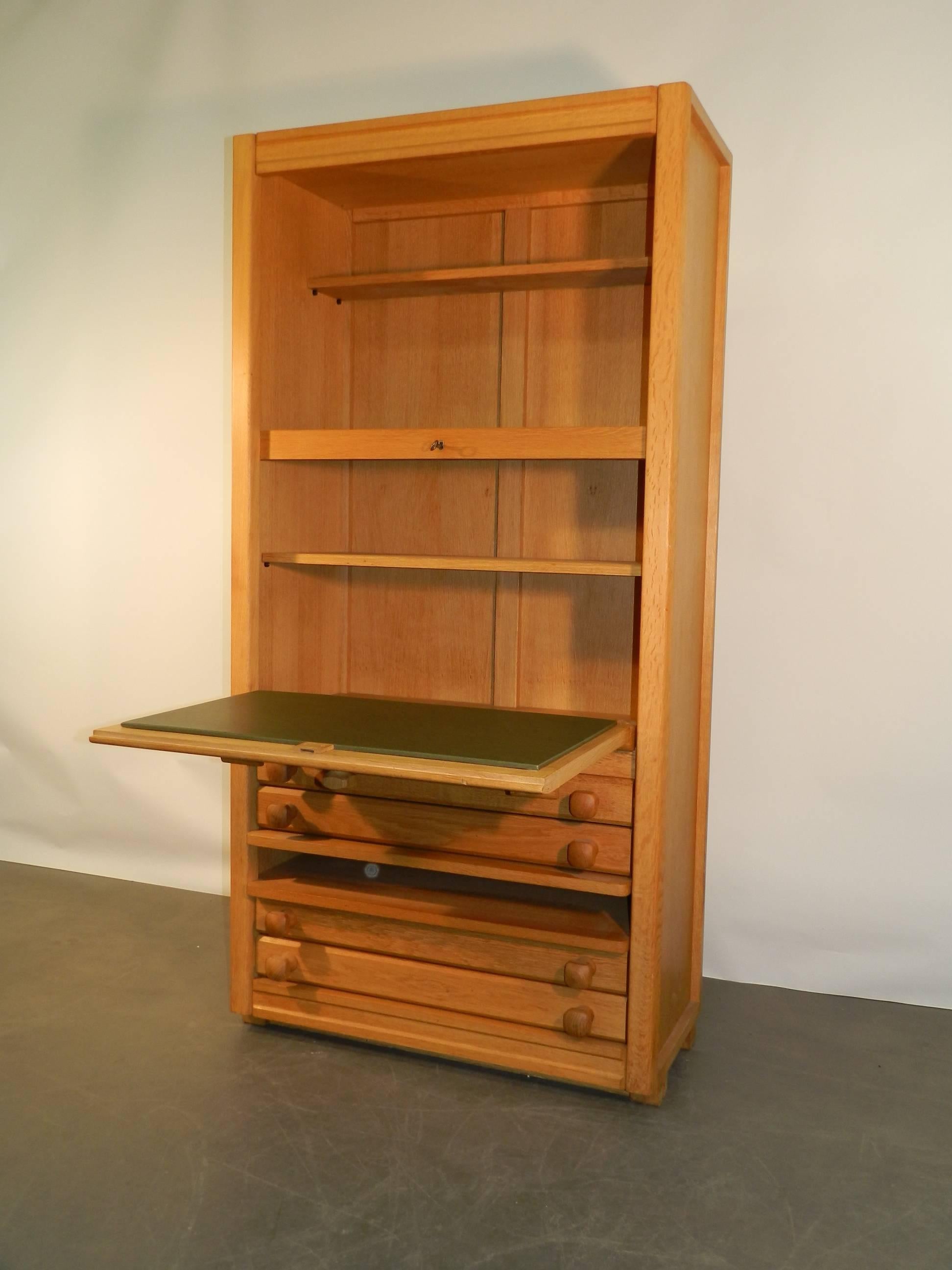 Oak storage cabinet by Guillerme et Chambron, circa 1970.