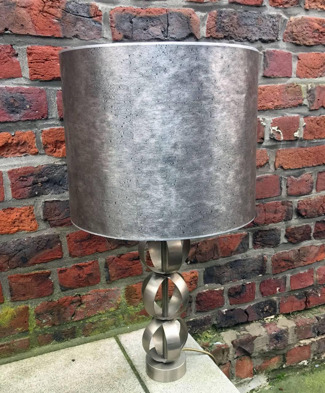 Set of four steel table lamps, circa 1970-1980.
The original shades are not in good condition.
 