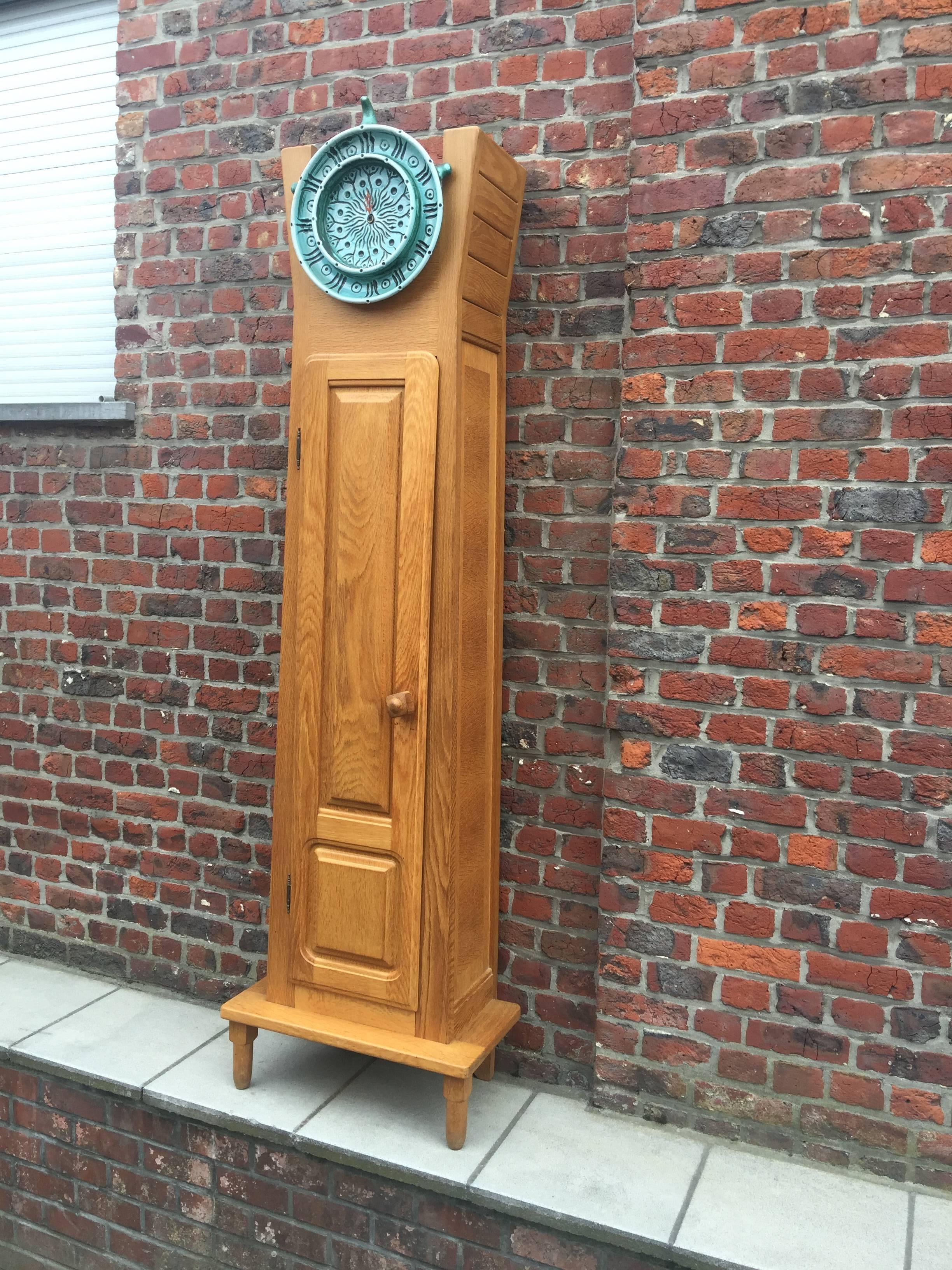 Guillerme et Chambron, rare oak longcase clock. Edition Votre Maison, circa 1970
Ceramic face by Boleslaw Danikowski.