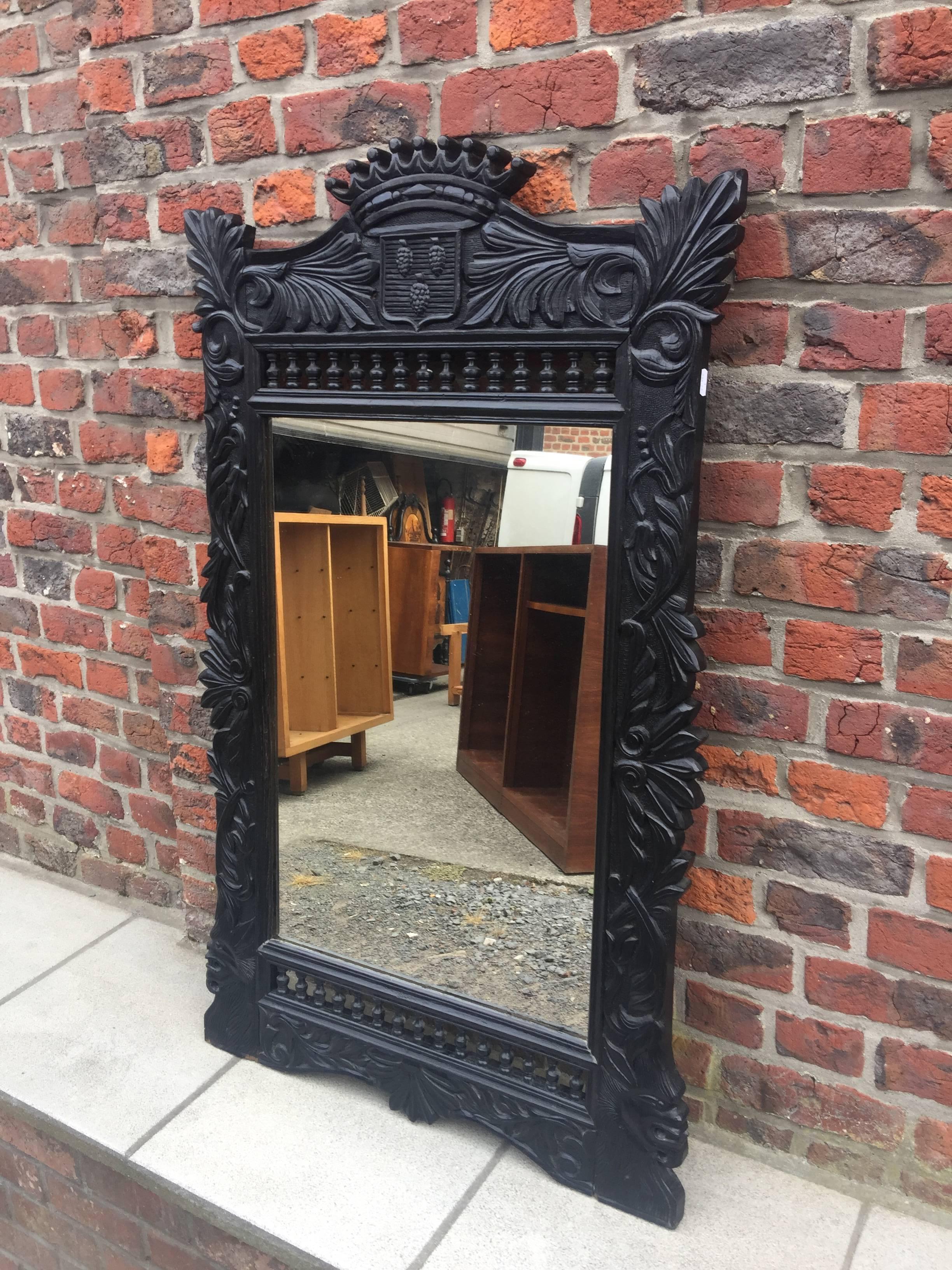 Carved blacken oak mirror, Breton style, circa 1900.