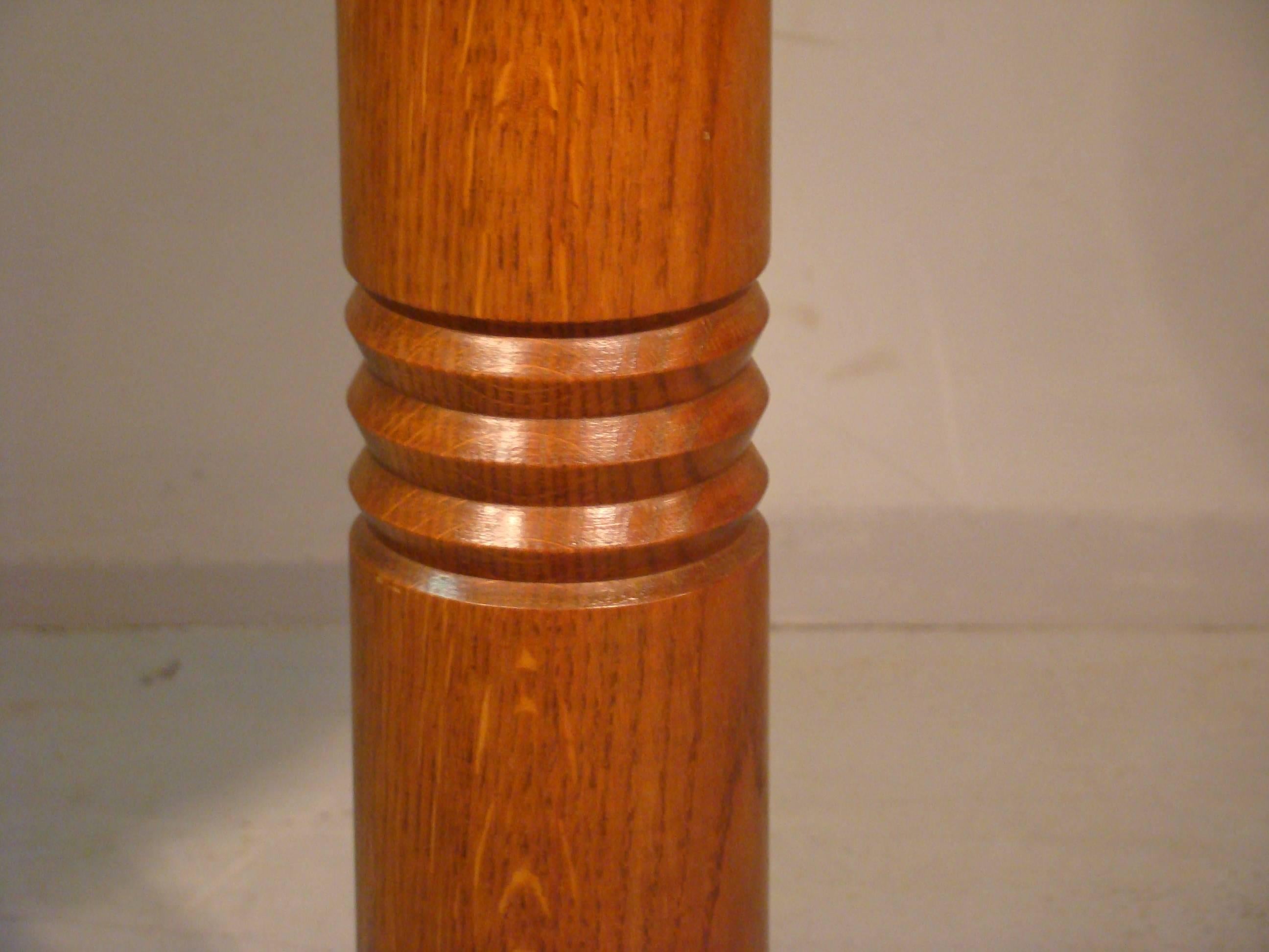 Art Deco oak gueridon circa 1940, in the style of Charles Dudouyt.