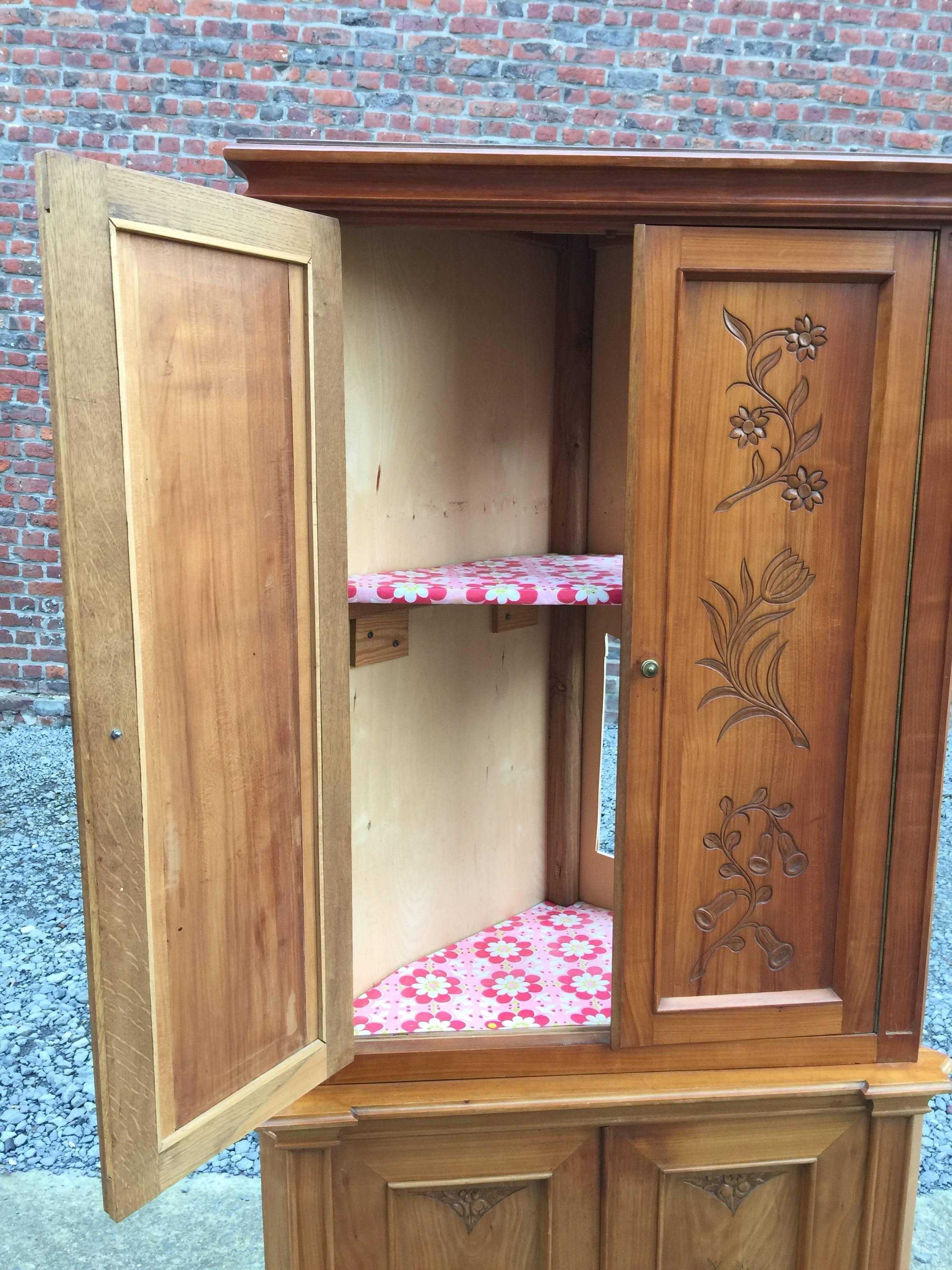 Art Deco cherrywood corner cabinet, circa 1940.