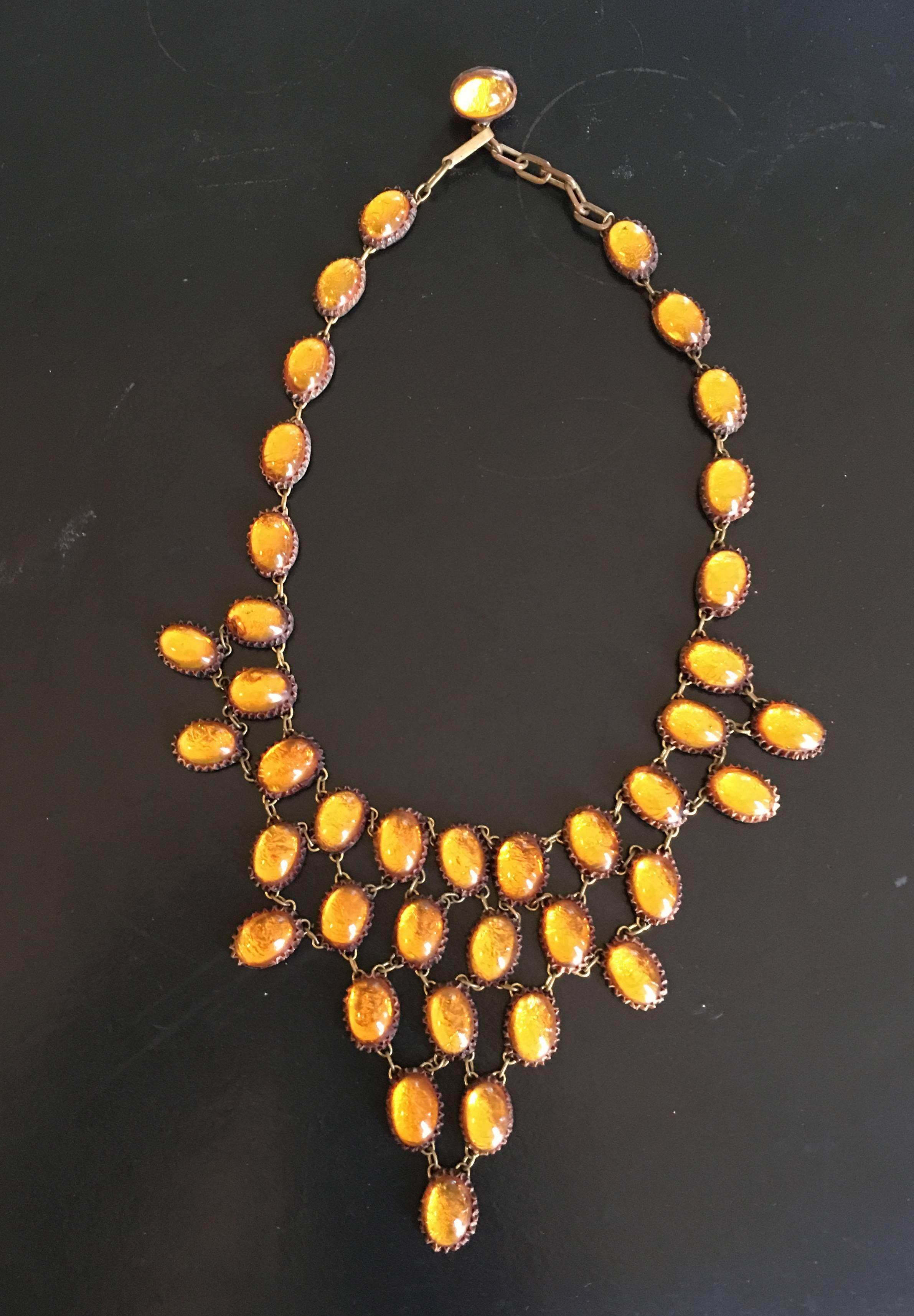 Honey amber Talosel necklace by Line Vautrin.