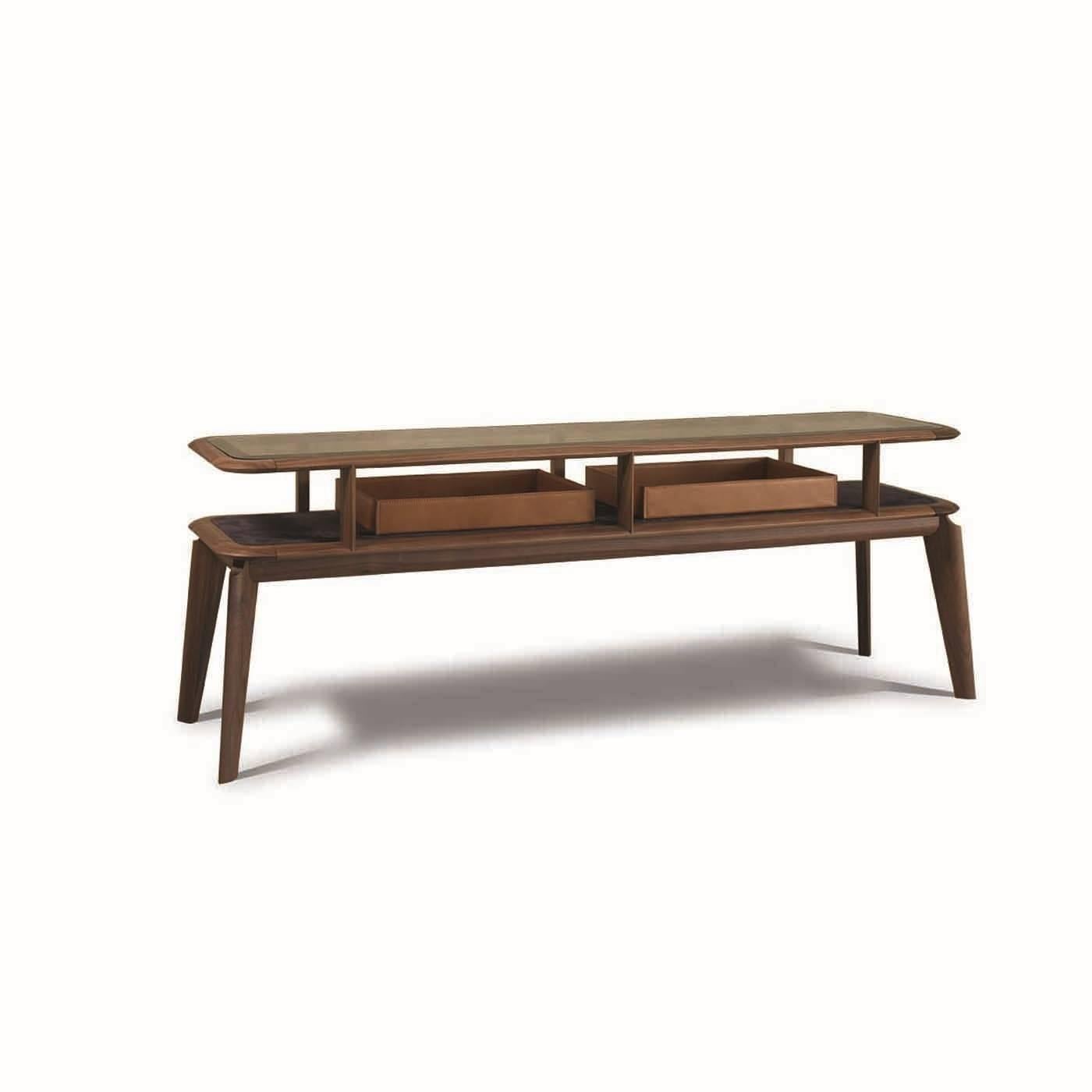 This contemporary console features a structure in solid American walnut wood supporting a rectangular top in bronzed glass, with the use of six short elements that separates it from the bottom shelf that is upholstered in fine leather. In between