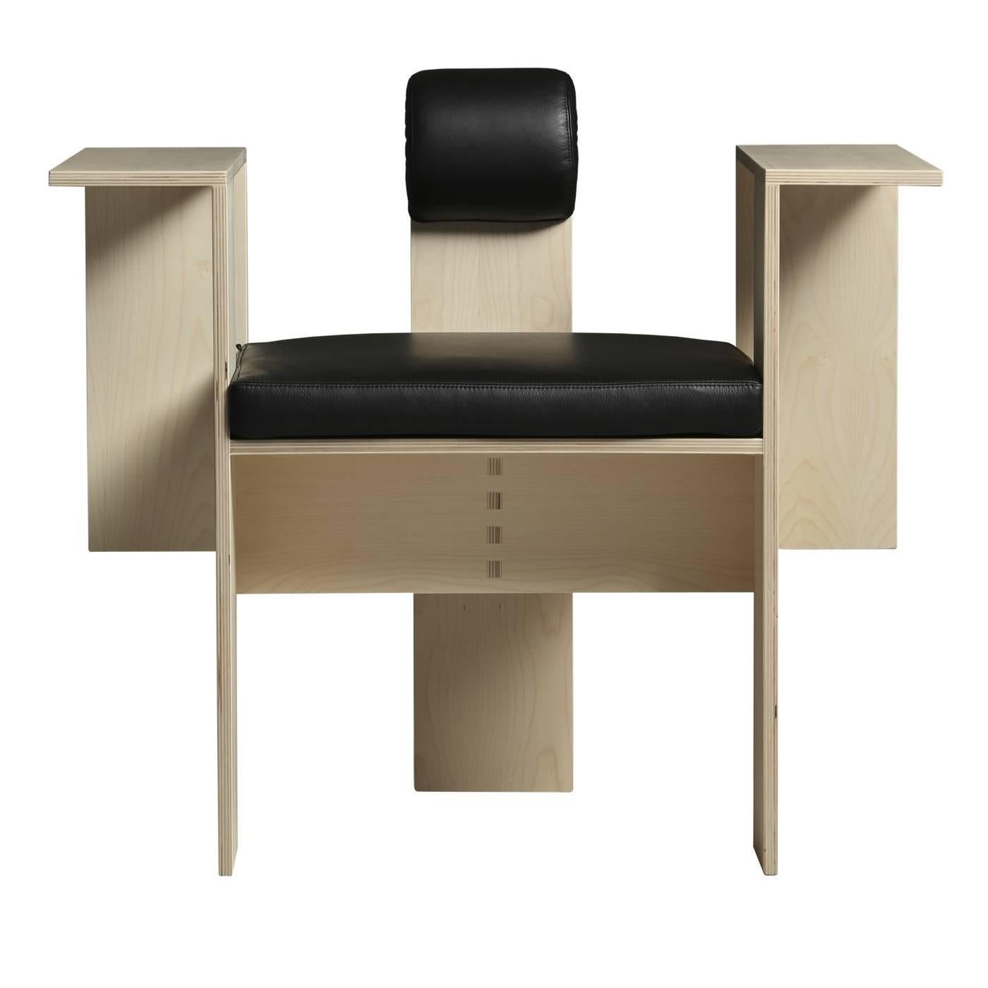 Designed by Mario Botta, this exquisite chair is a functional sculpture and will make an arresting effect in any room it is placed. The geometric shapes that make its contemporary silhouette are crafted in pieces assembled with joints in birch