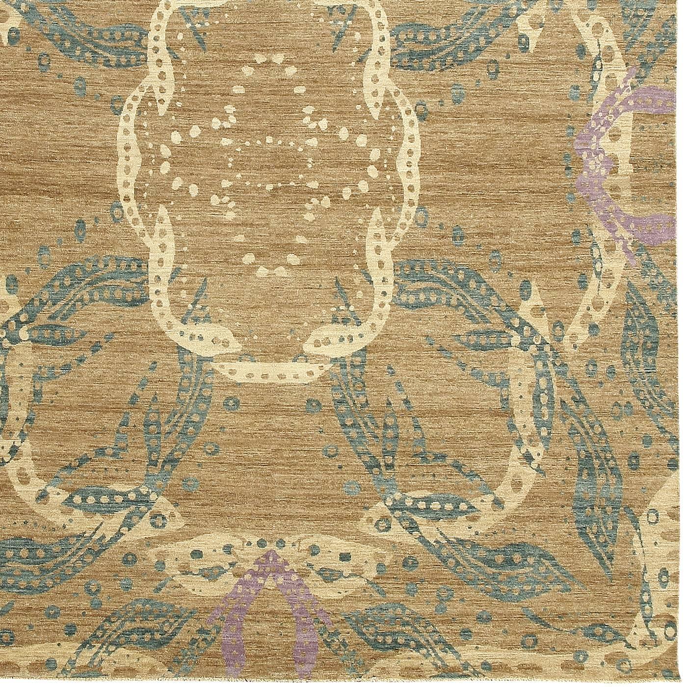 This hand-knotted wool carpet was designed by Allegra Hicks exclusively for Alberto Levi Gallery. Its simple rectangular shape is adorned with a symmetrical series of complex patterns that use delicate colors such as purple, green and beige over the