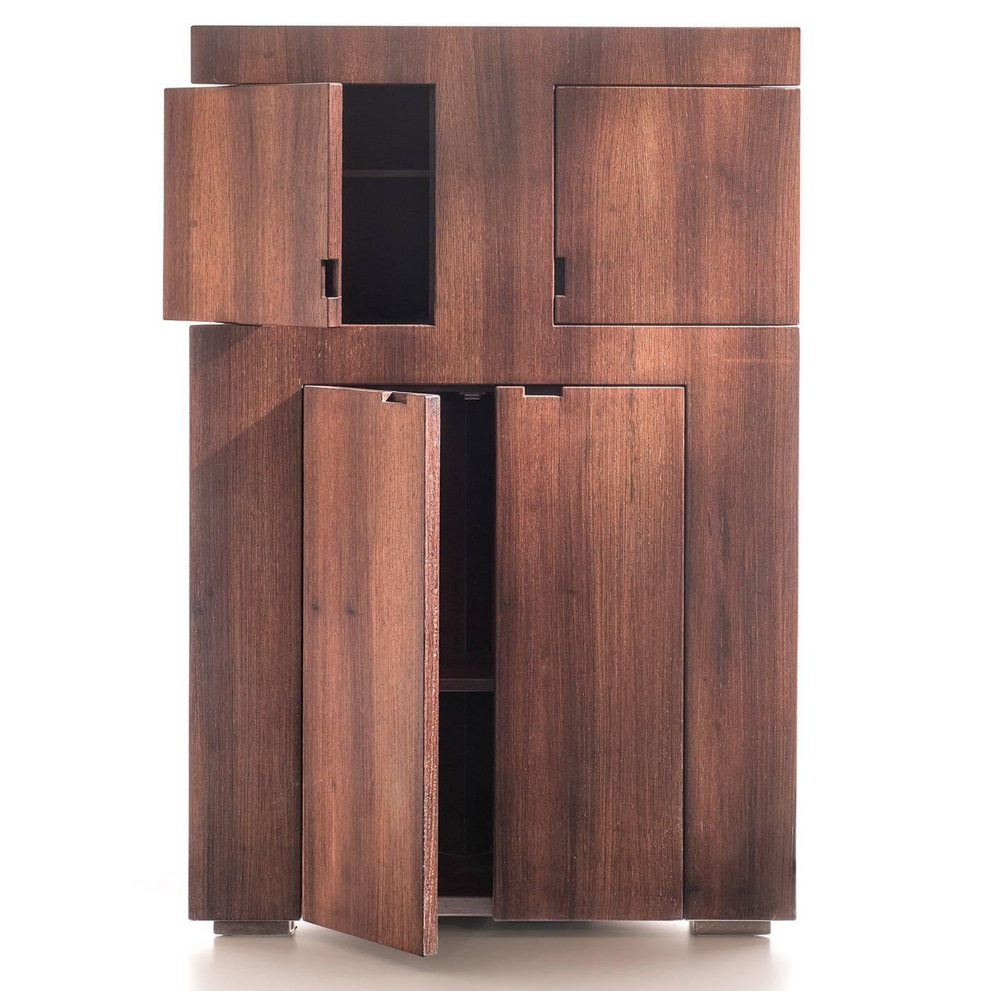 This elegant cabinet in smooth wenghe wood features four doors and two windows that open as a double-panel, swinging horizontally and giving the piece an interesting shape when used.