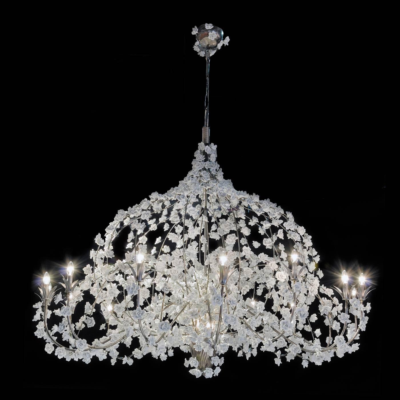 This luxurious chandelier is a true work of art featuring a polished metal structure covered in over 1,600 handcrafted pure white porcelain roses, the pure white shade achieved through a unique porcelain firing process. This piece was designed for