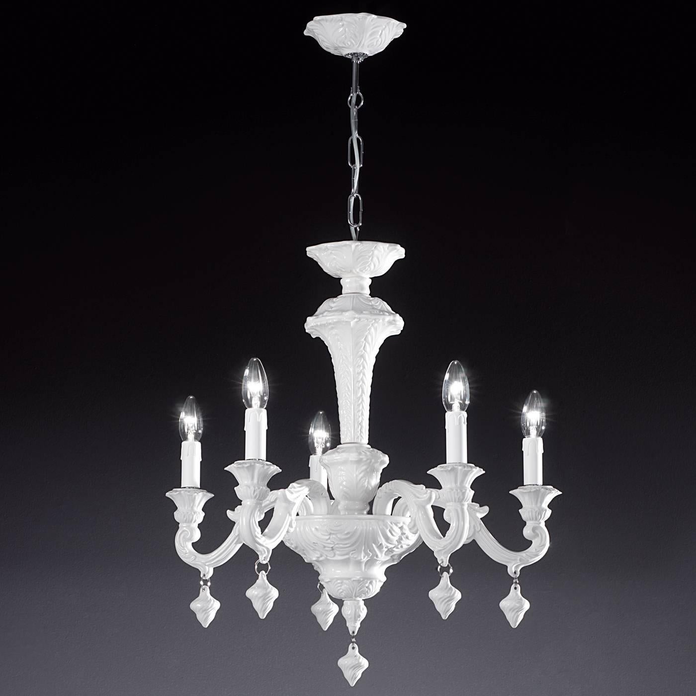 The Classic and refined Silhouette of this ceramic chandelier makes it a true beauty to behold. The extremely detailed and intricate surface decorations in bas-relief feature reproductions of acanthus leaves, an icon of Classic Italian design. This