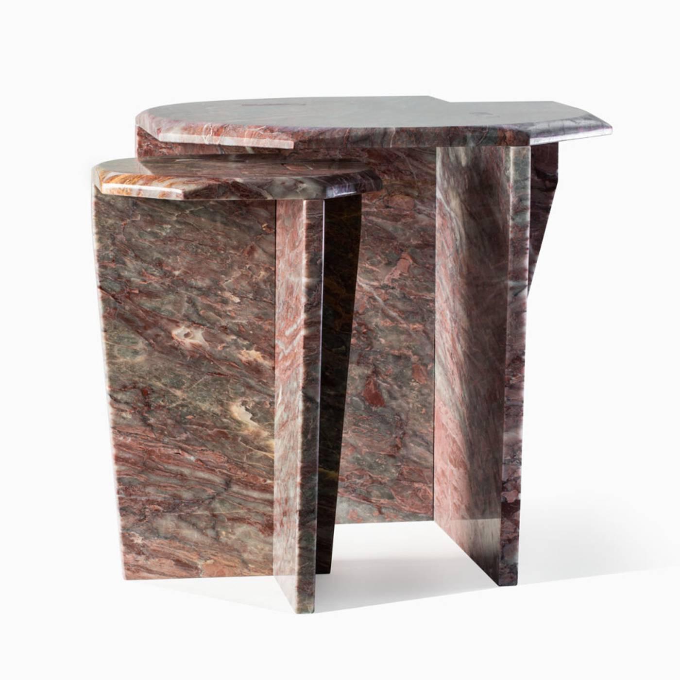 This striking marble coffee table rests on one central leg and it is made of 2 cm. thick Salomé marble. Top and support are connected with a dry joint with no glue nor screws and is the slightly larger version of the Z2 coffee table. It is very