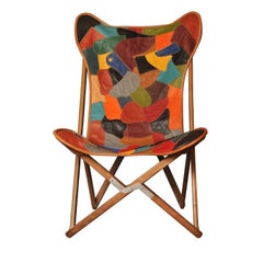 Fauteuil Tripolina en cuir patchwork