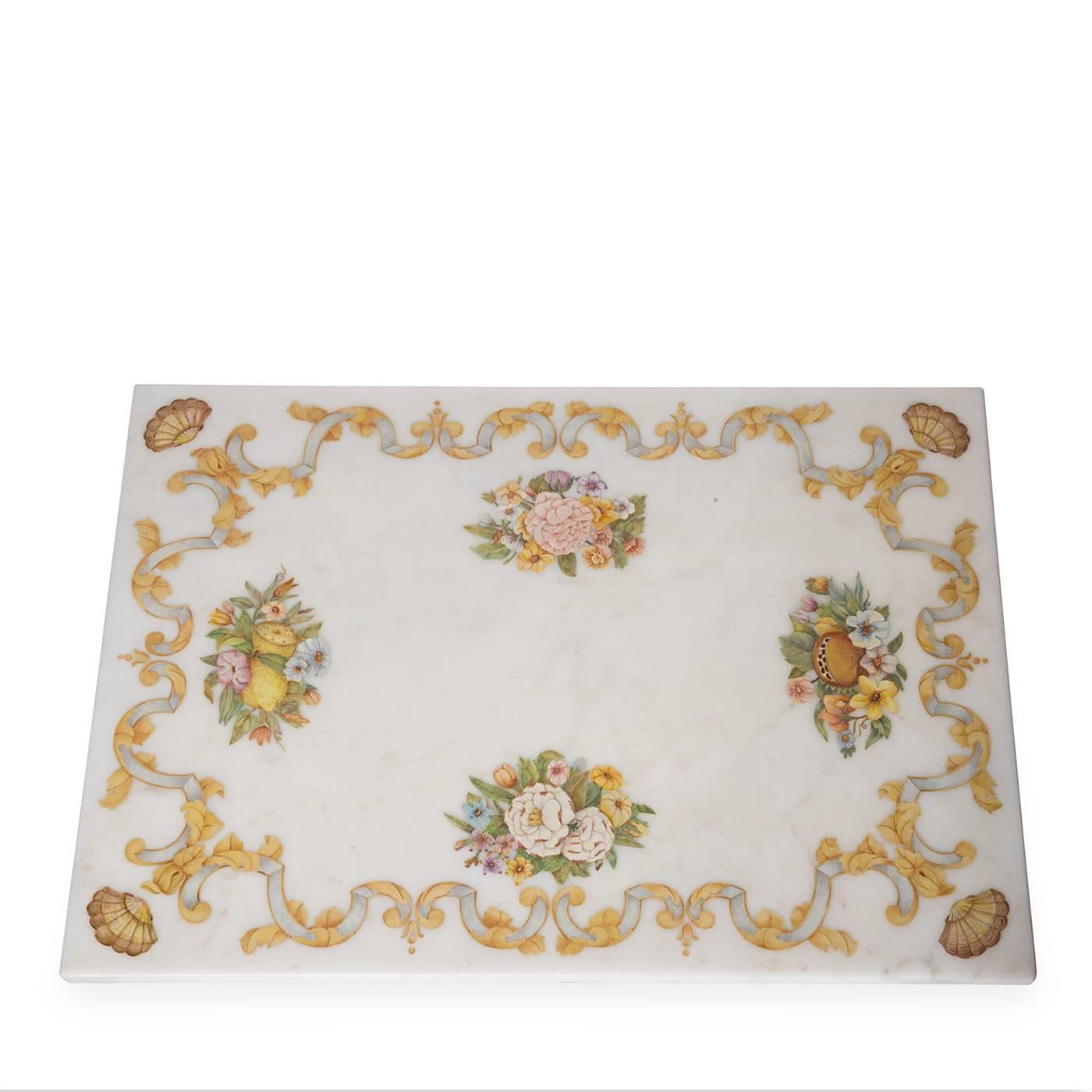 Tabletop handcrafted by Tuscan marble workshop Bianco Bianchi. The white marble is inlaid with a motif depicting flowers and fruit in a colorful scagliola inlay, and rests on an antique, hand-forged, wrought iron base.