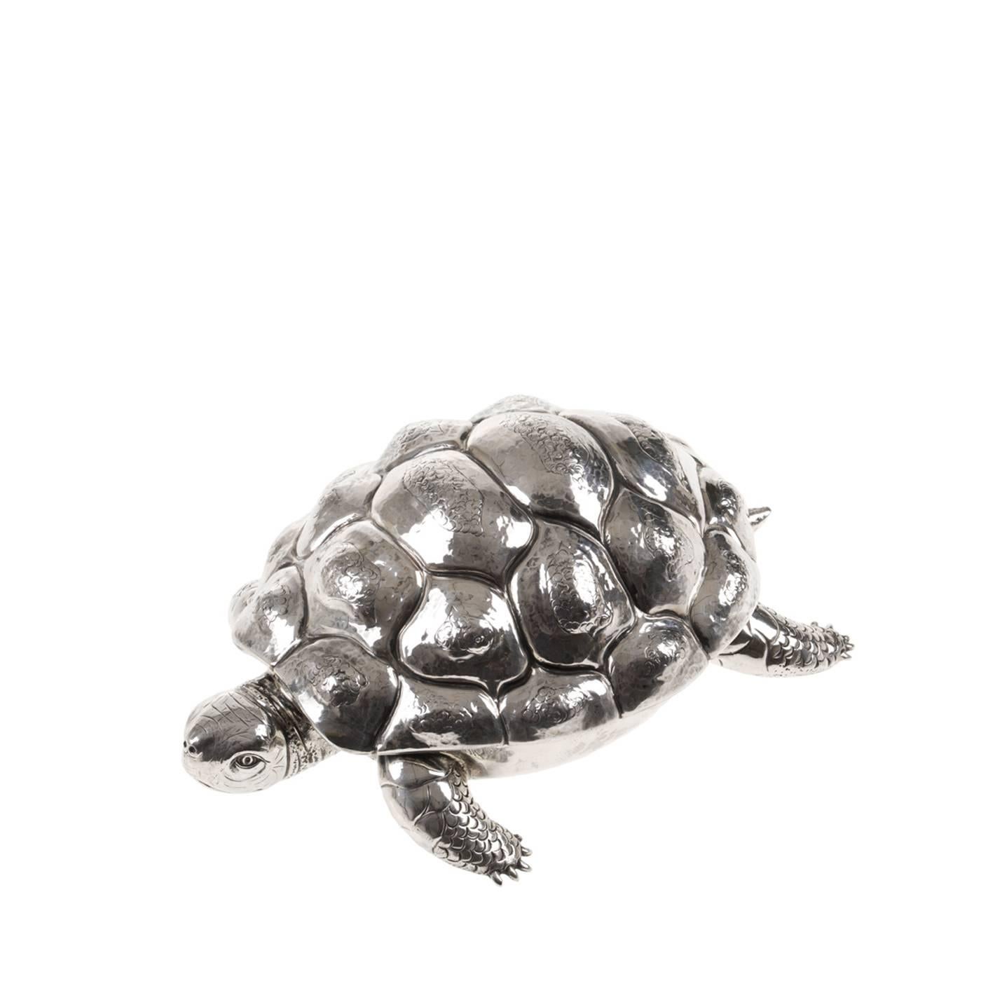Elaborate workmanship imbues this ornate box shaped like a turtle with indelible character. Entirely handcrafted from sterling silver by Florentine artisan silversmith house Fratelli Lisi, this piece is embossed and engraved by hand to achieve the
