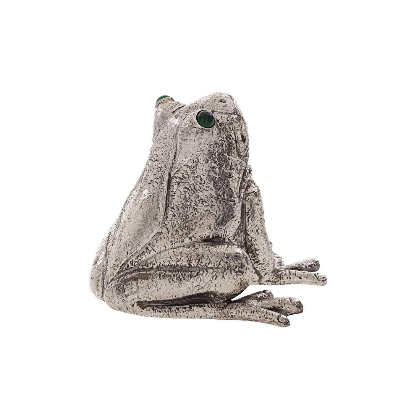 Playful true to life silver frog that serves as a lighter other than being a decorative piece of artwork. Expertly handmade by the Florentine silversmiths, the Lisi Brothers, its realism and expressive quality are quite uncanny.