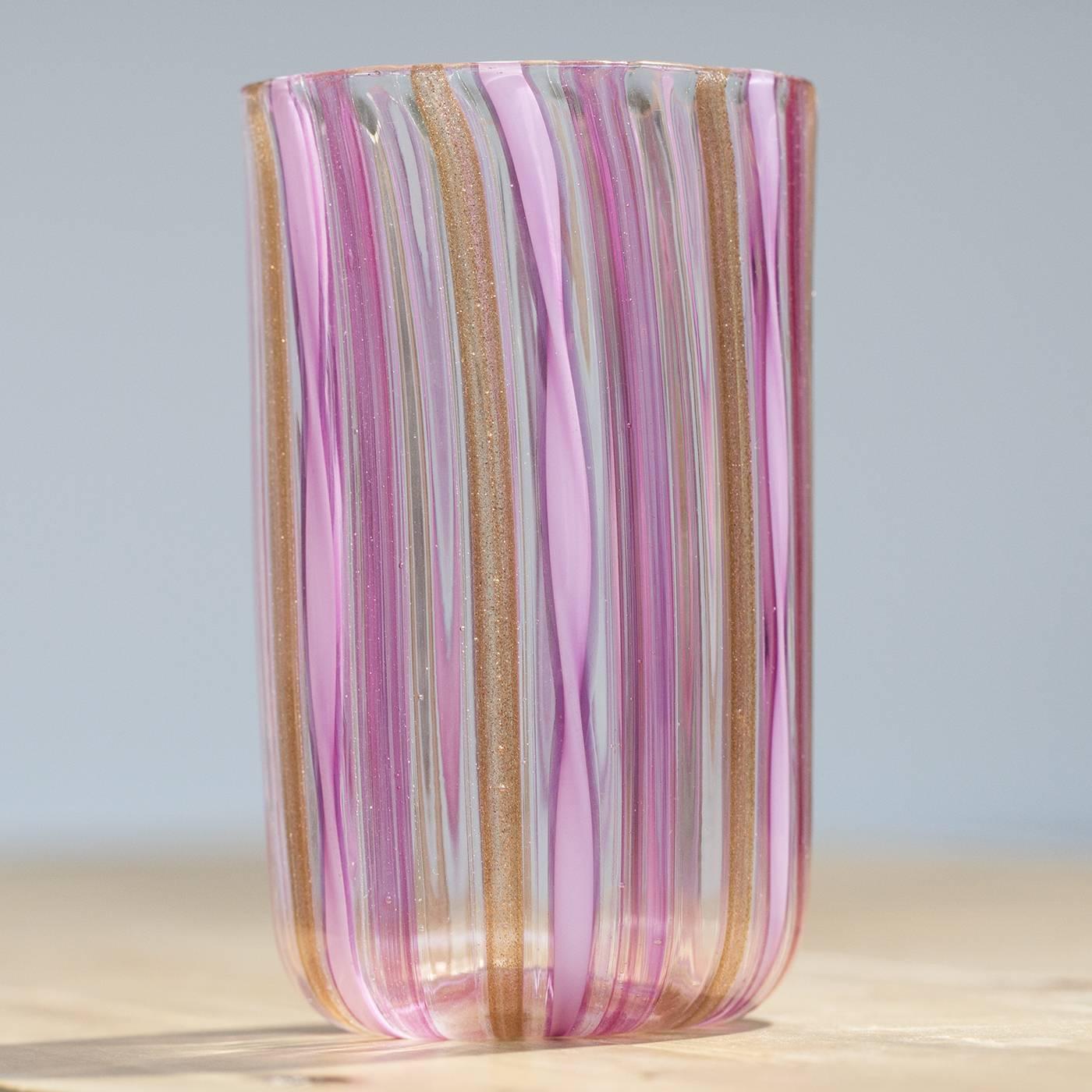 Set of six filigree Murano glasses made with the "a Canna" technique, where canes of colored glass are melted into a clear glass base. This beautiful pink and gold set includes six glasses entirely handcrafted on the Venetian island of
