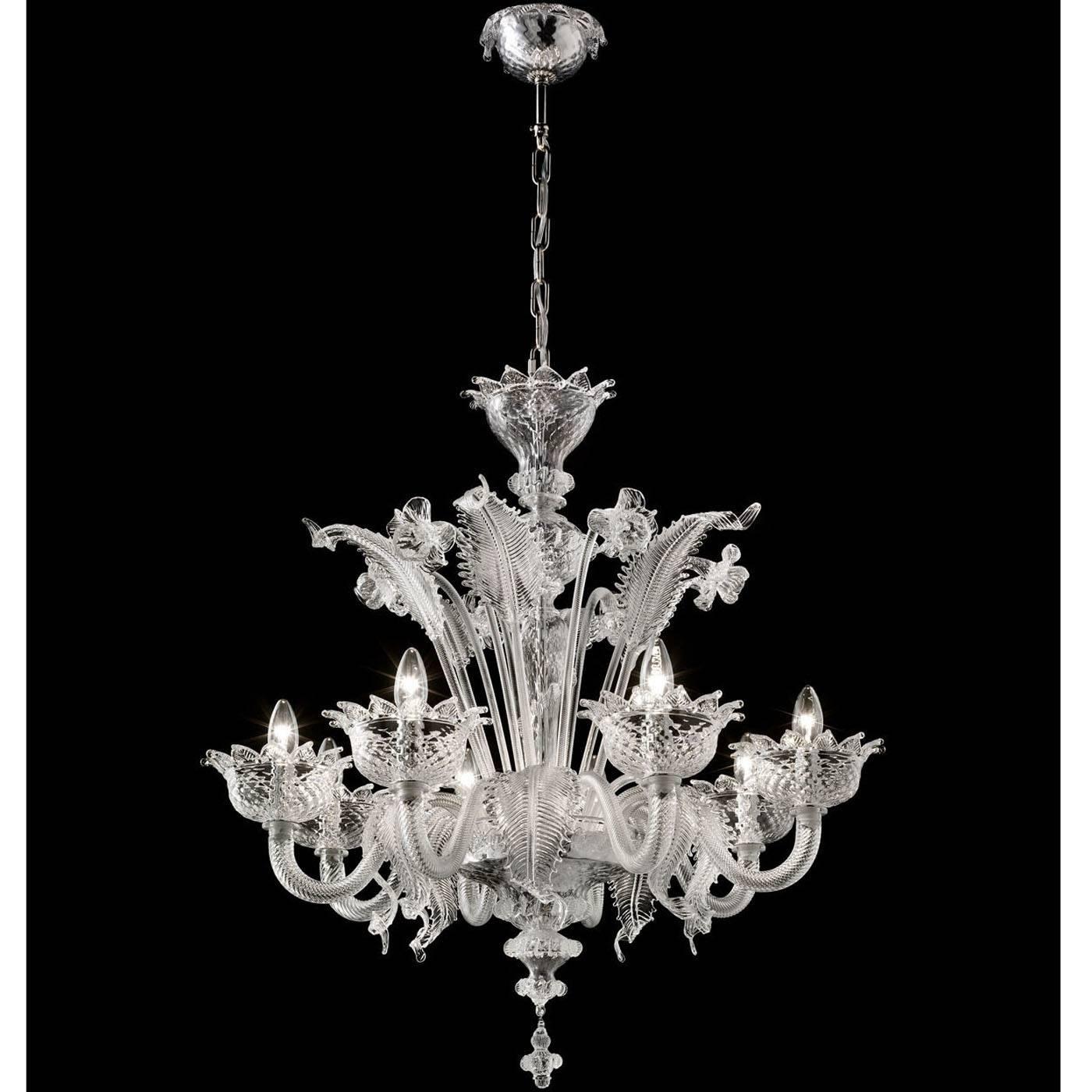 This magnificent chandelier in Murano glass features six lights elegantly adorned with an array of Fine flowers and leaves, reproducing a traditional model from the 19th century. The metal accents can be in galvanized gold or in polished chrome.