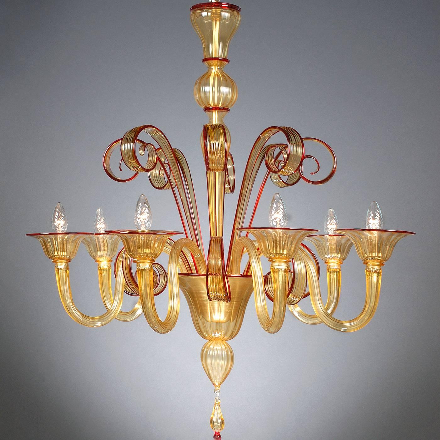 This striking chandelier features six lights supported by curved arms in a striking yellow color. The curls that decorate the top and central part of this piece are accented with red edges, giving a striking final effect.