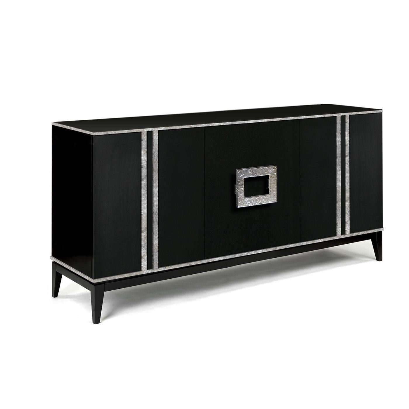 This three-door sideboard is beautifully crafted by the finest Italian artisans. The addition of a metal handle with the bright and intense effect of the hand-applied crinkled leaf offers a subtly glamorous appeal.