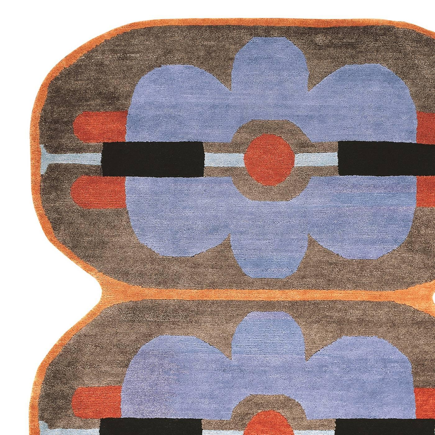 This striking carpet is part of a 36-piece limited series entirely handmade from the harvesting of the wool, to each step in the treatment of the wool till its spinning, from the knotting along with cotton to the final cleaning cycle, every phase in