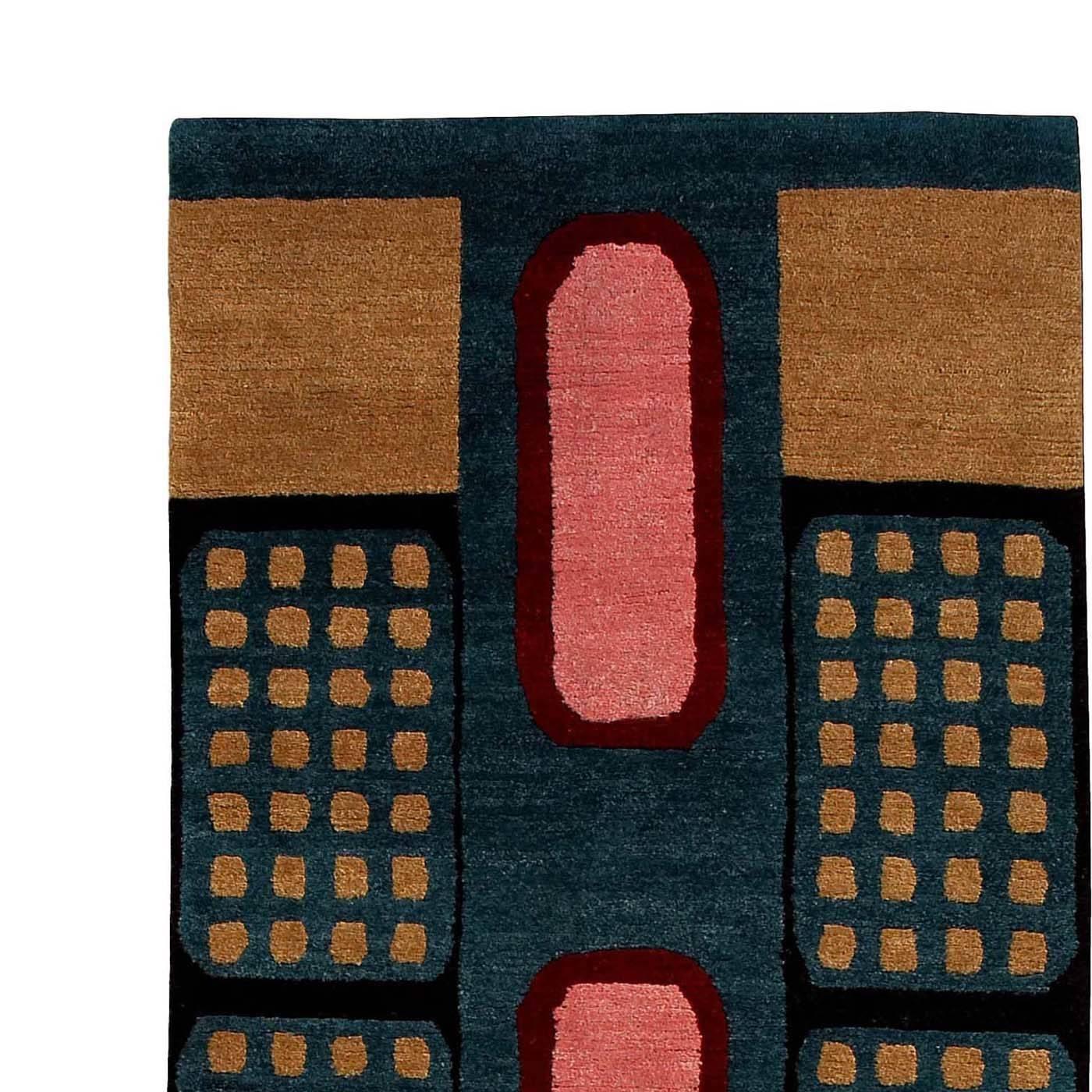 This unique carpet features vivid warm colors and a bold design by Nathalie du Pasquier, who also signed it. Part of a 36-piece series, this one-of-a-kind rug was entirely made by hand by expert artisans in Nepal who prepared the wool using