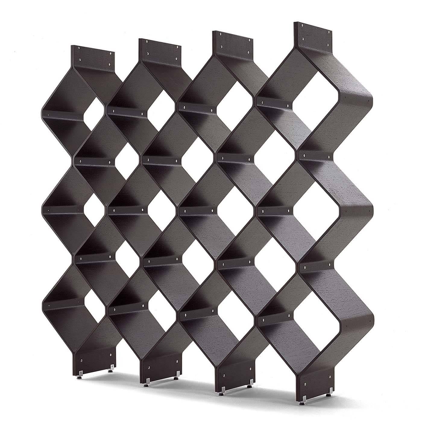 This unique and unconventional bookcase is an original Meroni Ceriani Cappelletti design that can double also as a space divider. A special flexible multi-layer wood was used to create the beehive pattern featured on the multifunctional piece of