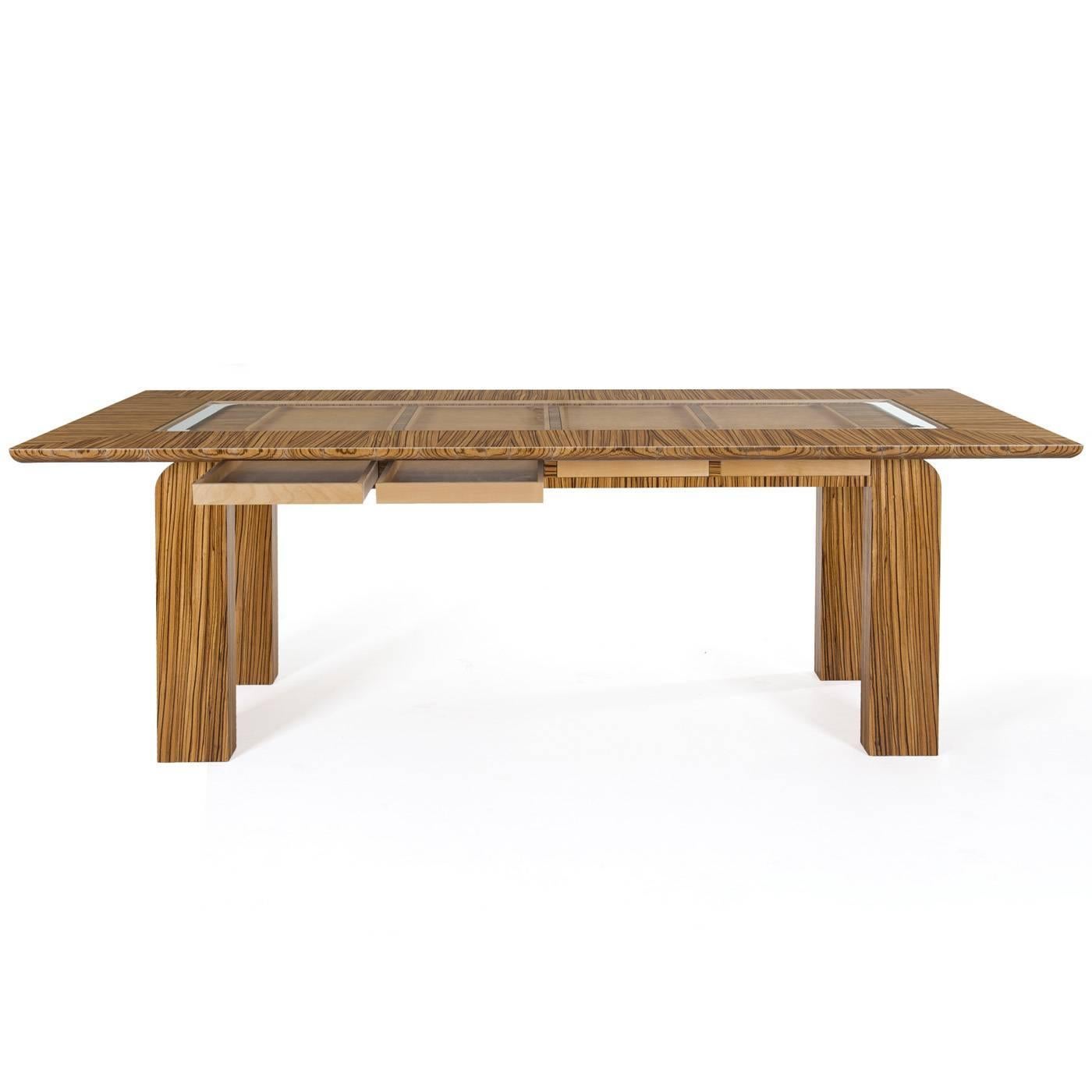 This table features a Minimalist silhouette that will make an elegant addition to any decor whether classic or contemporary. Its rectangular top, perimeter edge, and legs are all crafted entirely in zebrawood with accents in smoked maple wood and