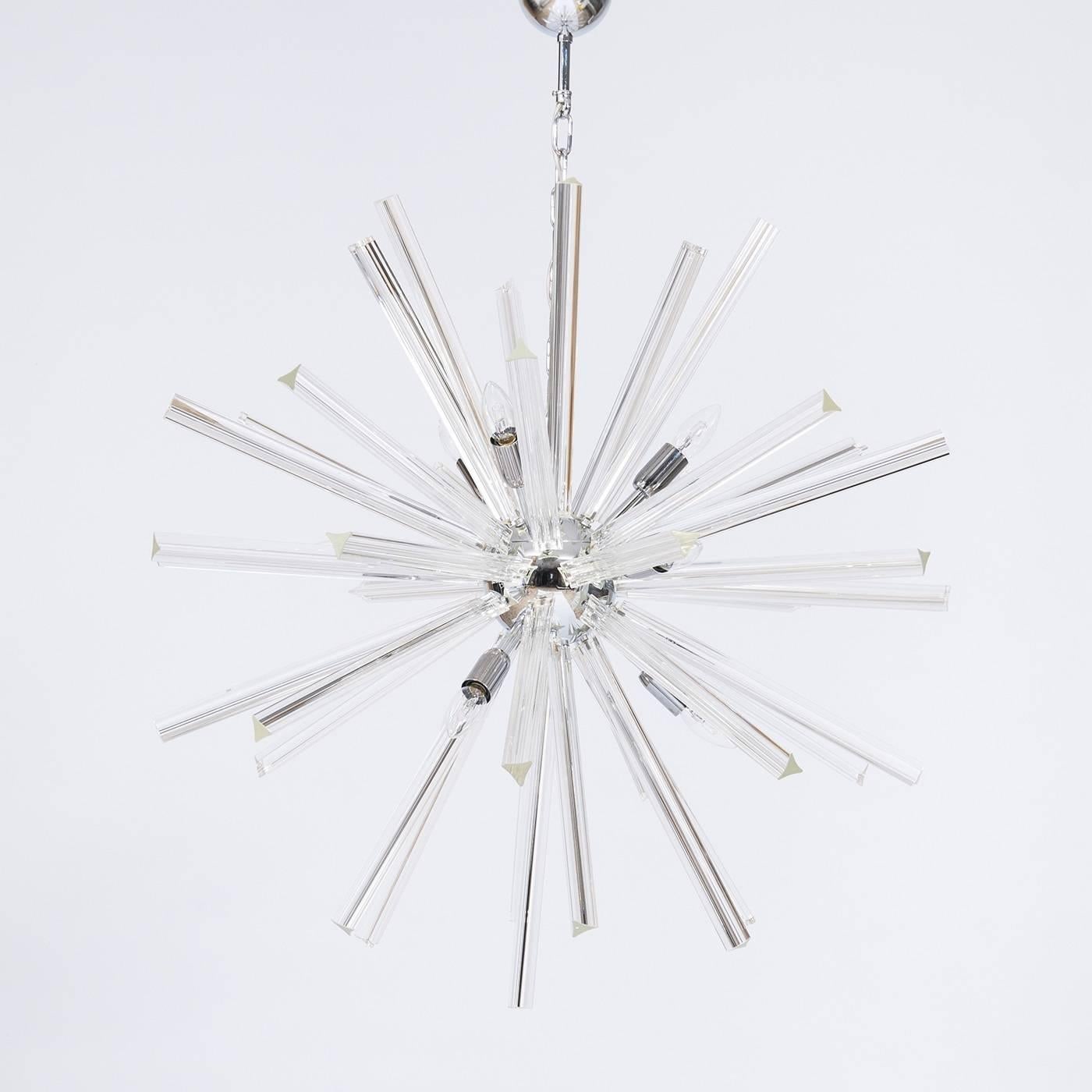 Spectacular Italian Venetian Sputnik chandelier in Murano glass, composed of transparent Triedro elements, supported by an elegant chrome frame. The chandelier is product by Giovanni Dalla Fina company in the Murano island of Venice, product and