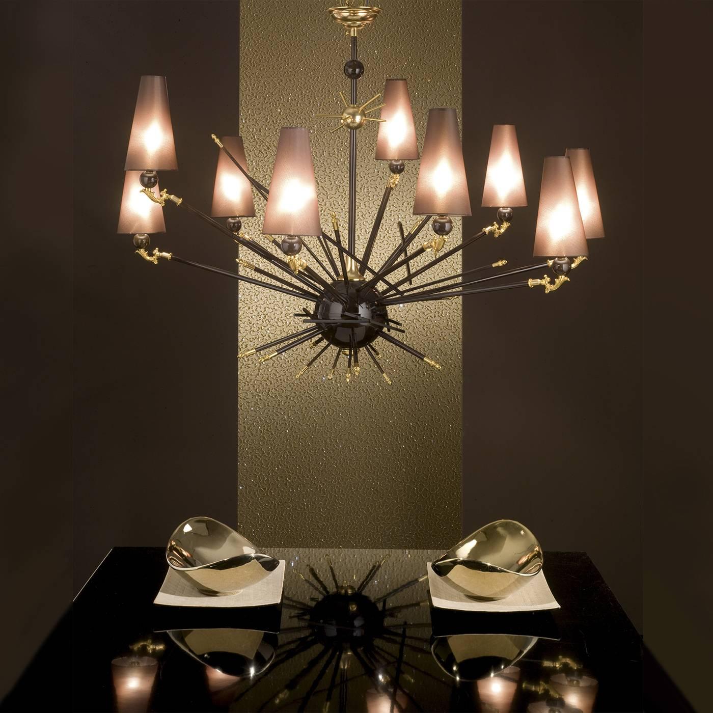 This exquisite piece of functional home decor can be paired with the matching Z468 sconce to make a striking statement in a dining room or living room. A spherical element is suspended from above and from it several arms extend, each one holding its