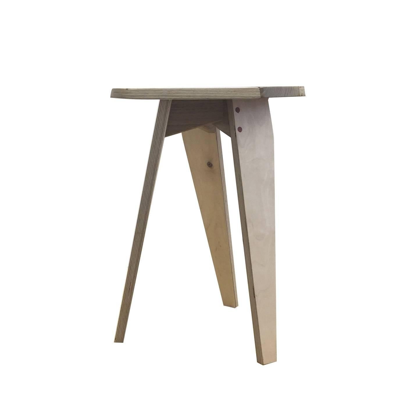 Part of a series of stools entitled LW, this piece can also double as a small table or side table, thanks to its simple and versatile shape. The three legs in ashwood and solid beechwood support a top in multi-layer birchwood whose pale coloration