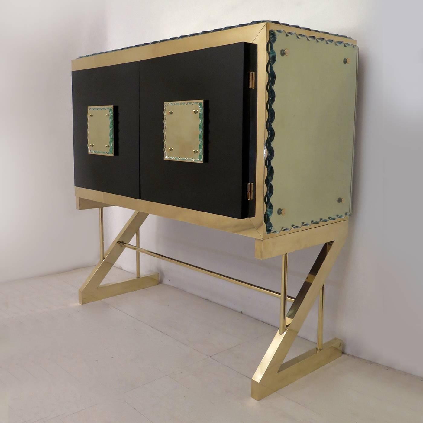 This console will perfectly complement a contemporary home. This piece combines both classic and modern shapes and colors, in order to produce a unique look. The underlying wooden structure of the rectangular top is covered in brass plates, along