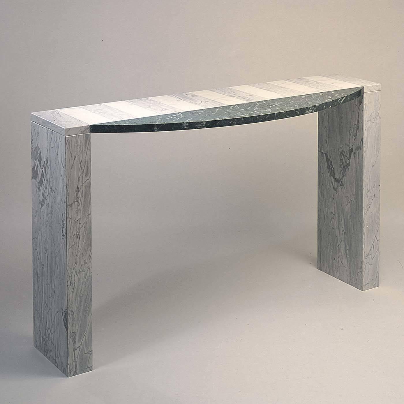 Behind the simple and clear-cut line of this captivating console designed by Eric Gottein lies a combination of impeccable construction and craftsmanship that place lightness at the heart of the design. Combining the highest quality natural stones,