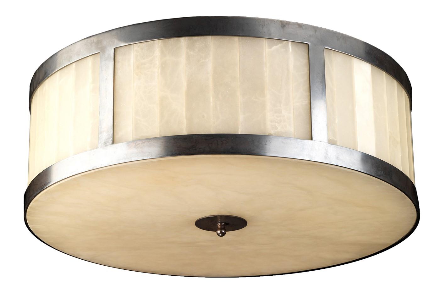 A refined addition to a modern-styled home, this exquisite flush mount light fixture boasts traditional craftsmanship. A Classic Silhouette with a retro twist, this piece features a Classic drum shape crafted in alabaster and framed with vertical