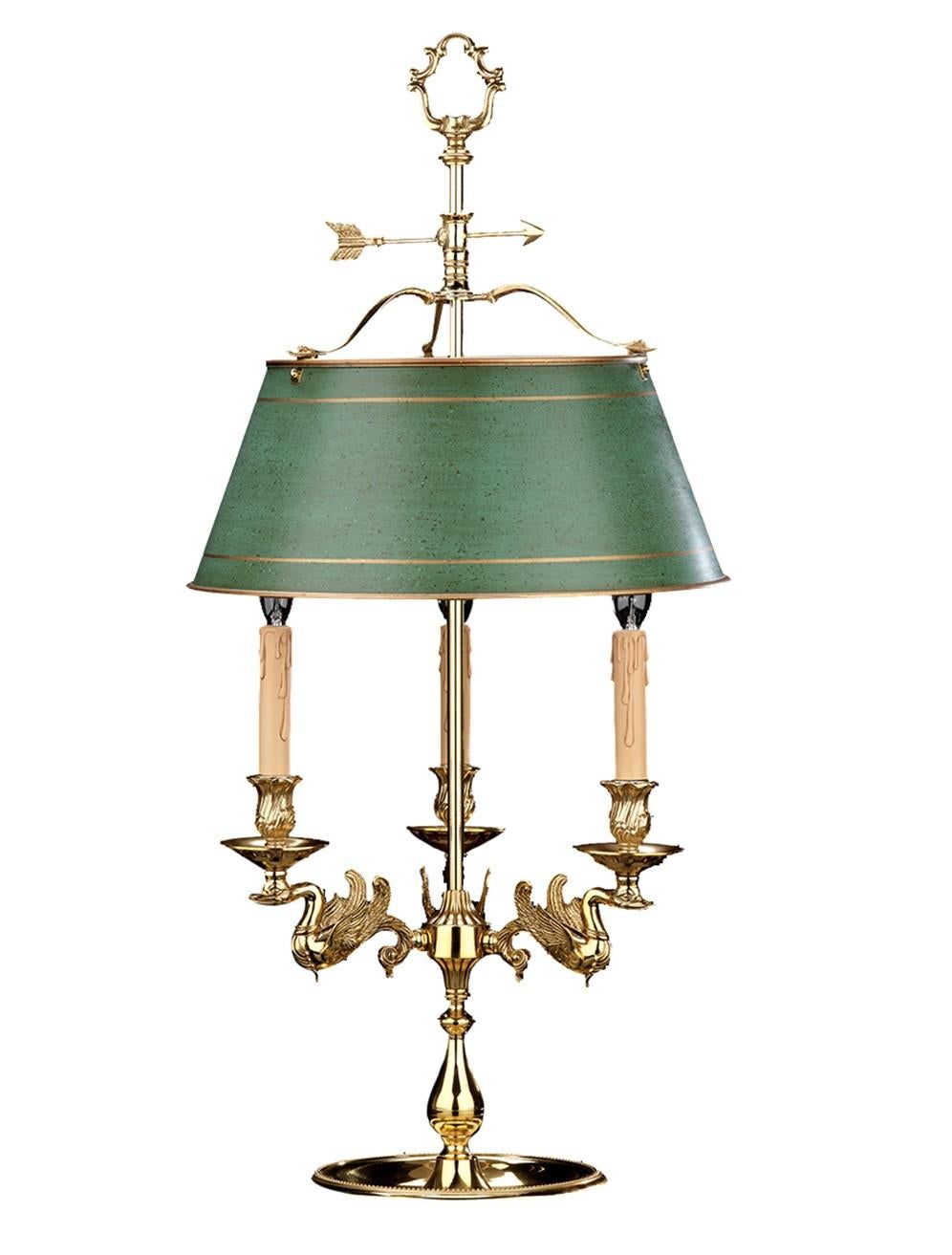 This magnificent table lamp will brighten a bedroom or living space with timeless elegance. The piece is distinguished by a balanced, concave base with a gold finish and three arms accented with vividly-rendered swan motifs, hallmarks of fine