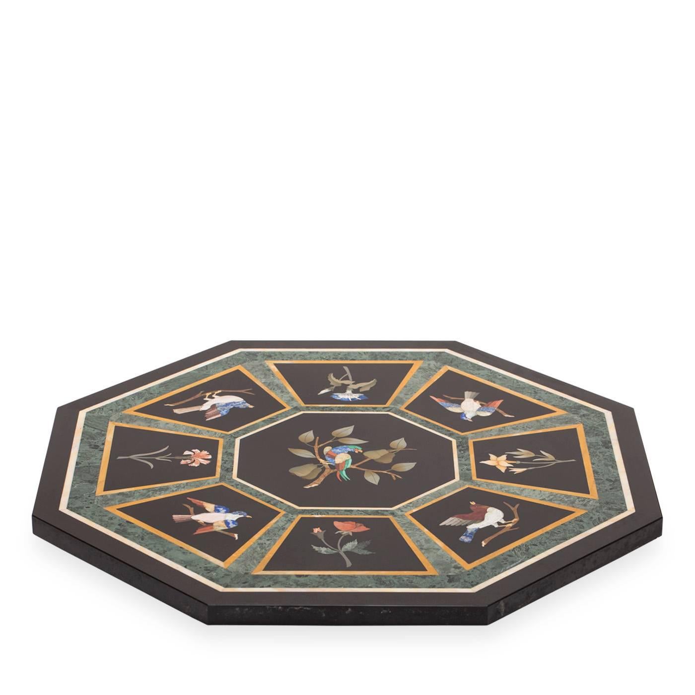 Florentine mosaic table base. Materials: Black Belgian Marble, Yellow Siena Marble, Verde Guatemala Marble, Semi-Precious Stones.  The marble inlay base is decorated with a motif of birds and flowers. 
         