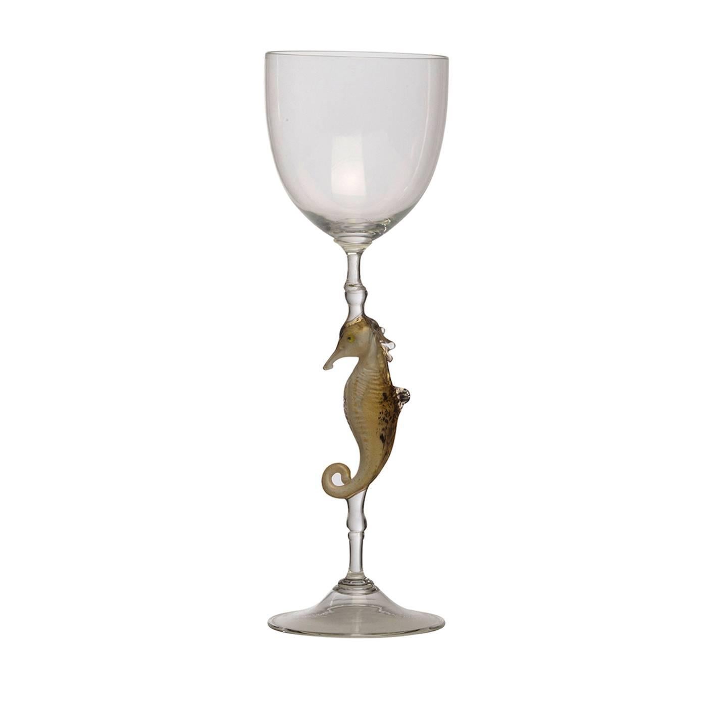 A set of graceful and precious wine glasses in clear Murano glass by famous Venetian glass master Dario Frare. Each glass is handcrafted using the traditional blowing technique, while the stems are adorned with a small sculpture of different and