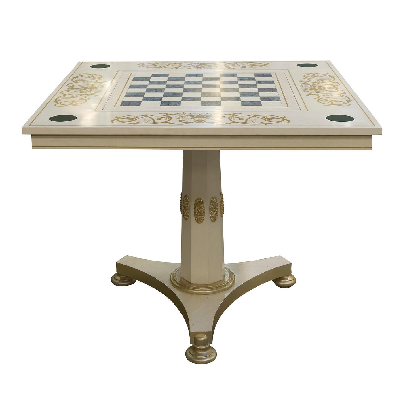 Simply captivating, this game table boasts a solid wood structure with white erable veneer and brass inlays. The checkerboard game surface is crafted from luminous white and Abalone mother of pearl, creating a stunning visual effect. Each corner