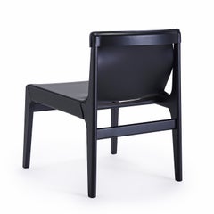 Poltrona in pelle nera Burano di Balutto Associati