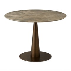 Mesa de comedor de exterior grande y redonda con tablero de mármol gris del Sáhara