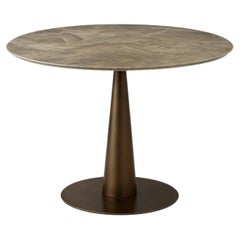 Mesa de comedor de exterior grande y redonda con tablero de mármol gris del Sáhara
