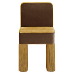Fauteuil Lilli en velours jaune doré à franges