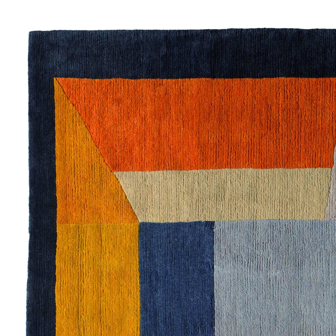 This striking piece by Chung Eun Mo is part of a limited series of 36 carpets made by hand in Nepal in a factory that employs only master artisans and helps its neighborhood by giving a school to their children and a hospital to the Community. The