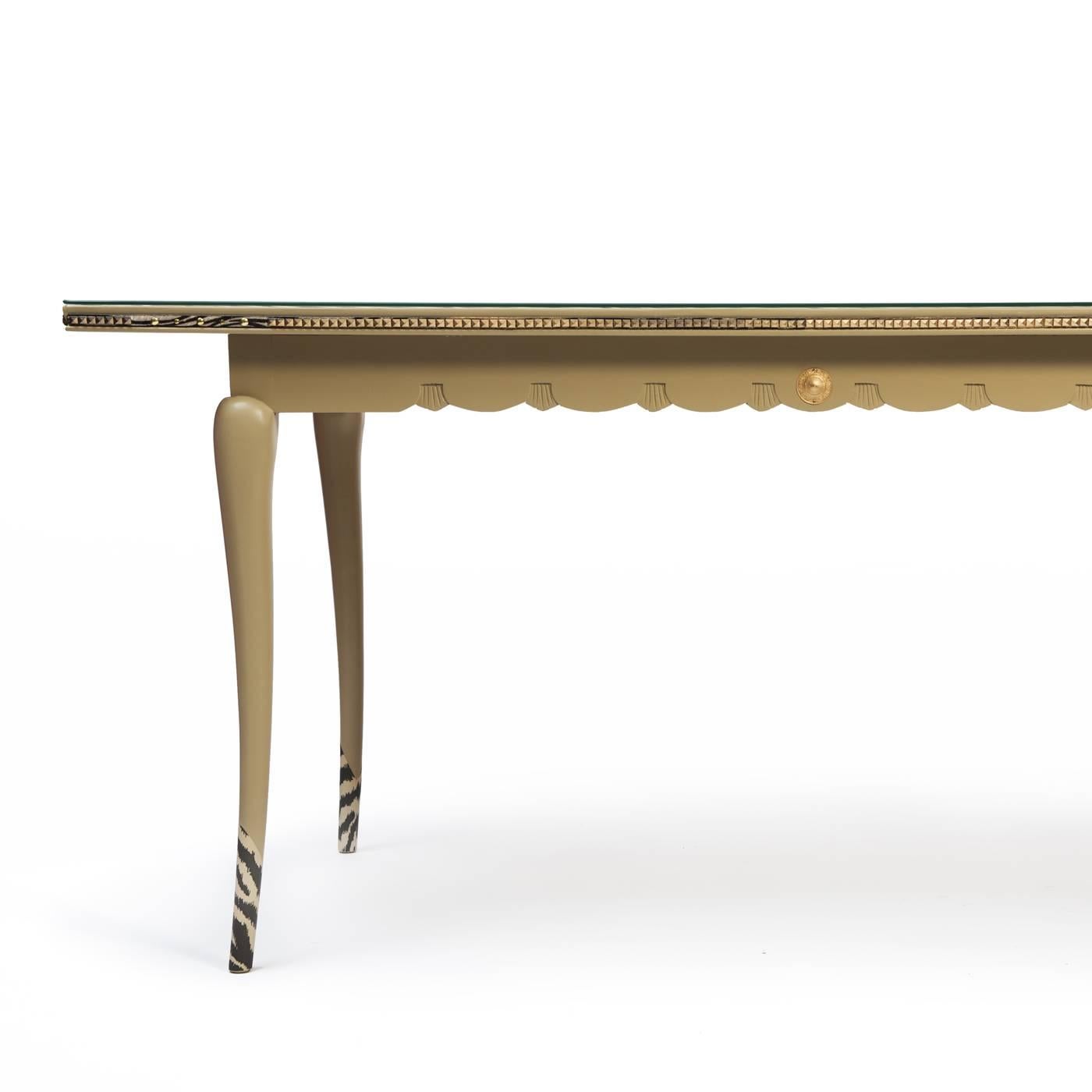 This sophisticated table in wood with a sand lacquer finish can also double as a desk and its delicate Silhouette with slightly curved legs will be a unique addition to any decor. The tips of the slender legs are adorned with zebra patterns, while