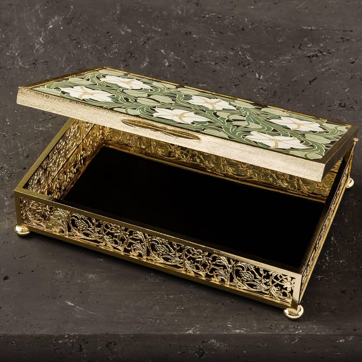 This box is a on-of-a-kind work of expert craftsmanship and is part in the Luxury collection by Bianco Bianchi. The lid is attached by a gold-plated bronze hinge. The wrought iron structure features strikingly intricate details which were made by